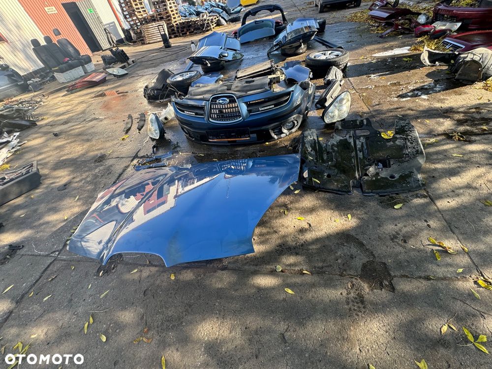 Subaru tribeca b9 maska osłona pod silnik lampy przód filtr obudowa filtra zderzak przód wzmocnienie górne pas belka przód chłodnica oleju chłodnica klimy zbiorniczek spryskiwaczy zawiasy maski błotnik prawy lewy węże wspomagania drzwi prawe lewe przednie tylne progi felgi koła klapa tył lampy tył belka tył zderzak tył - 4