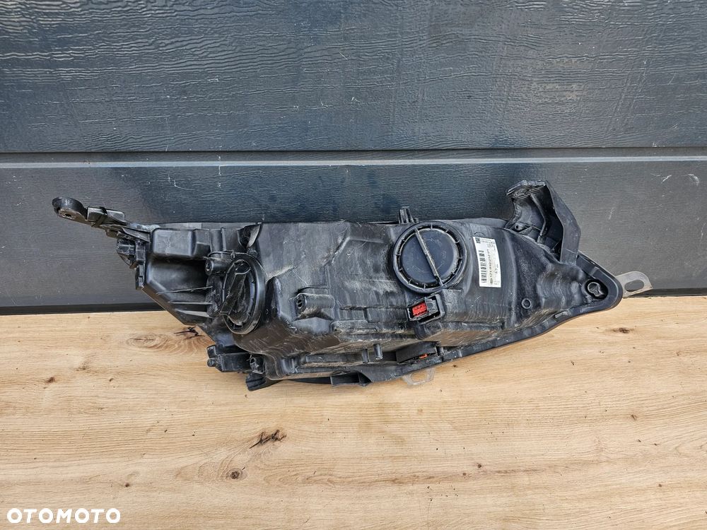 LAMPA LEWA PRZEDNIA LEWY PRZÓD OPEL ASTRA J BI-XENON EUROPA DEMONTAŻ ORYGINAŁ PRZED LIFT PO LIFT 13253650 - 16