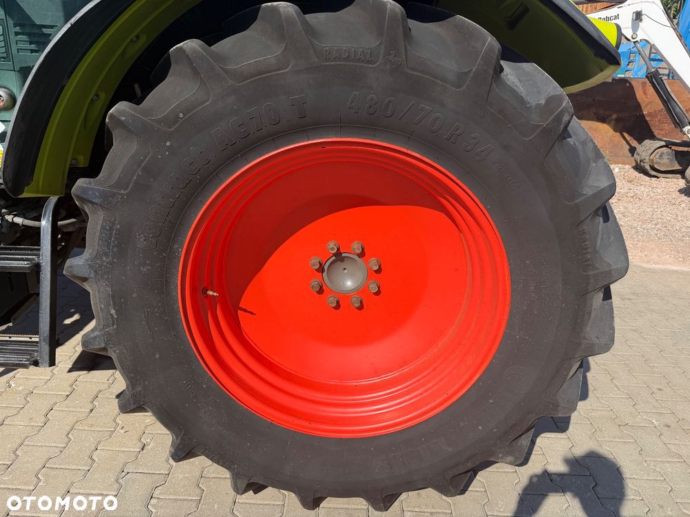 Claas Axos 320 - 13