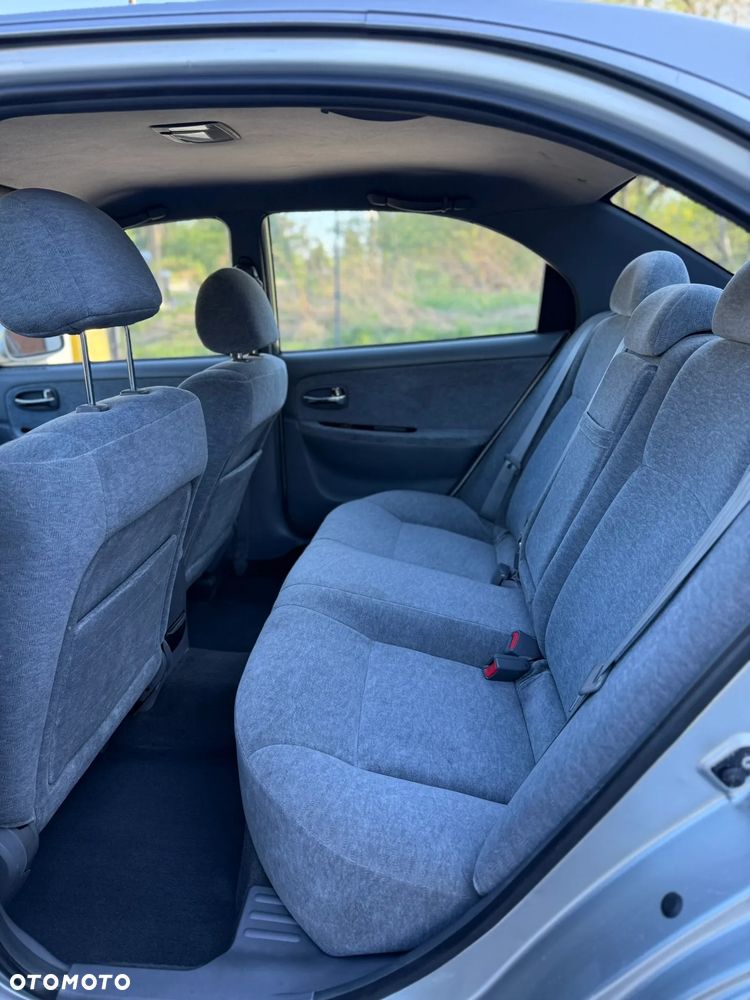 Kia Magentis 2.0 (air4) / Gold - 15