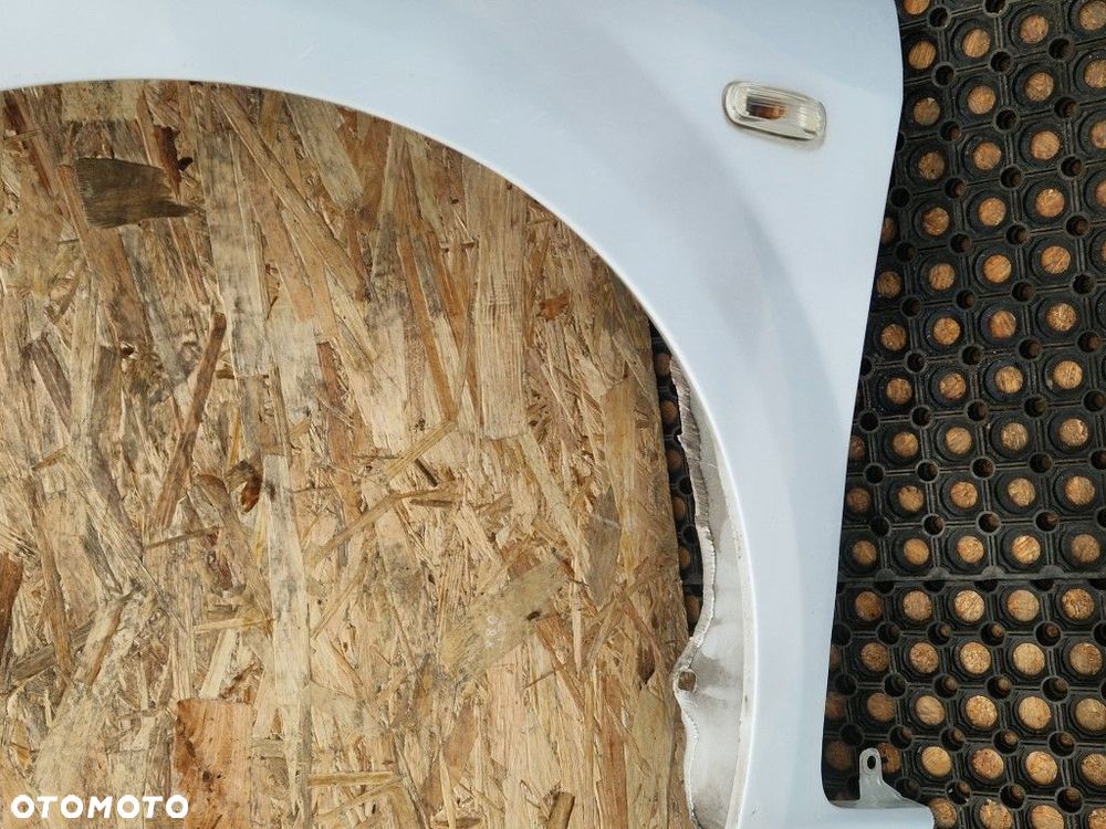 FIAT PUNTO EVO kod lak.760 a BŁOTNIK PRZÓD PRZEDNI LEWY - 4