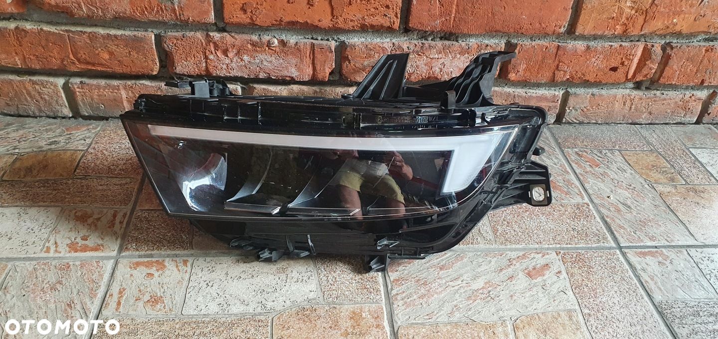 OPEL ASTRA VI L 23r LAMPA LEWY PRZÓD 9851881380 - 1
