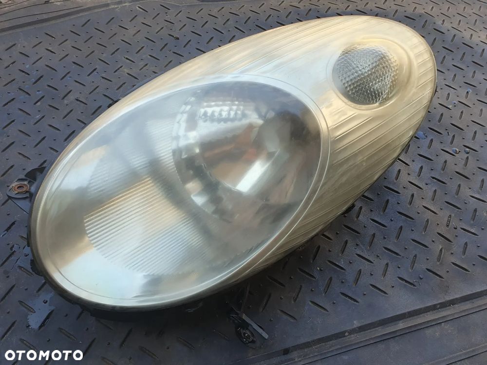 NISSAN MICRA K12 REFLEKTOR LAMPA LEWY PRZÓD LEWA PRZEDNIA 26060AX700 89007101 ORYGINAŁ - 2