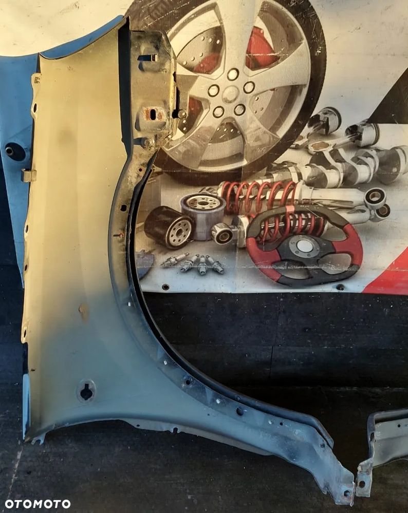 BŁOTNIK PRAWY PRZÓD OPEL CORSA C Z20R - 11