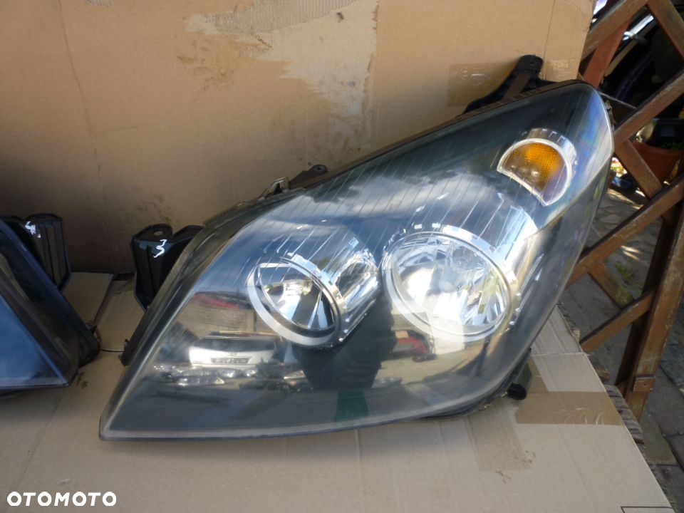 Lampa  lewa OPEL ASTRA H HELLA EUROPA - 4