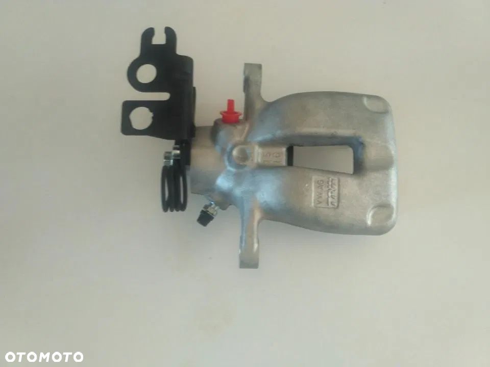 Zacisk tył Lewy Prawy Volkswagen Caddy III - 2