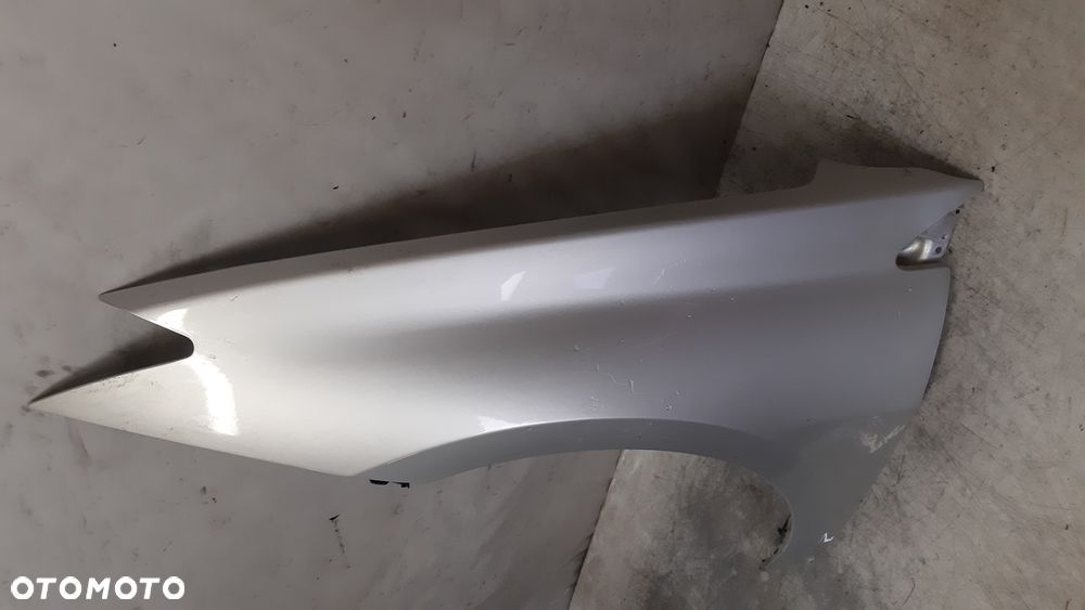 * RENAULT LAGUNA III 3 BŁOTNIK  PRZEDNI PRZOD LEWY TED69 SREBRNY - 2