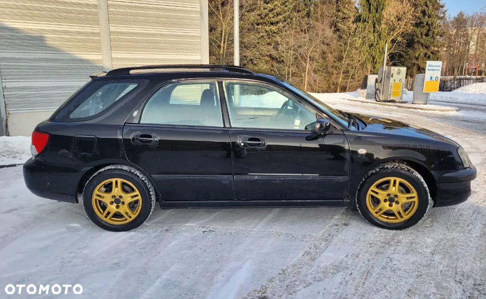 Subaru Impreza SW 2.0 GX 4x4 - 4