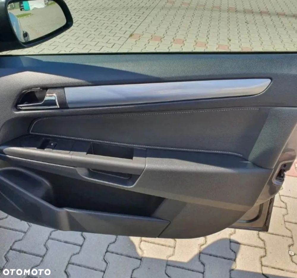 Opel Astra 1.6 Cosmo - 11