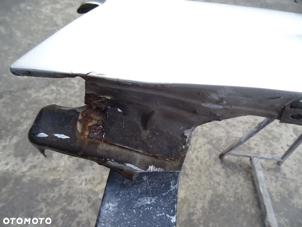 Błotnik Dacia Logan Lewy Przód - 4