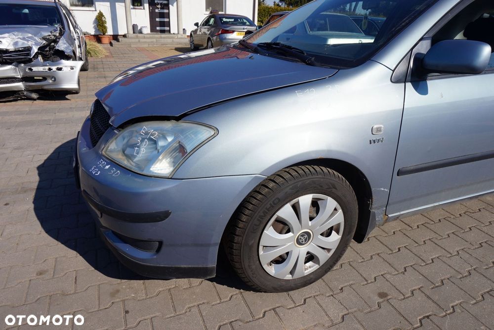 MASKA ZDERZAK BŁOTNIKI LAMPY COROLLA E12 8Q3  TOYOTA 2001-2004 SREBRNY PRZÓD KOMPLETNY - 12