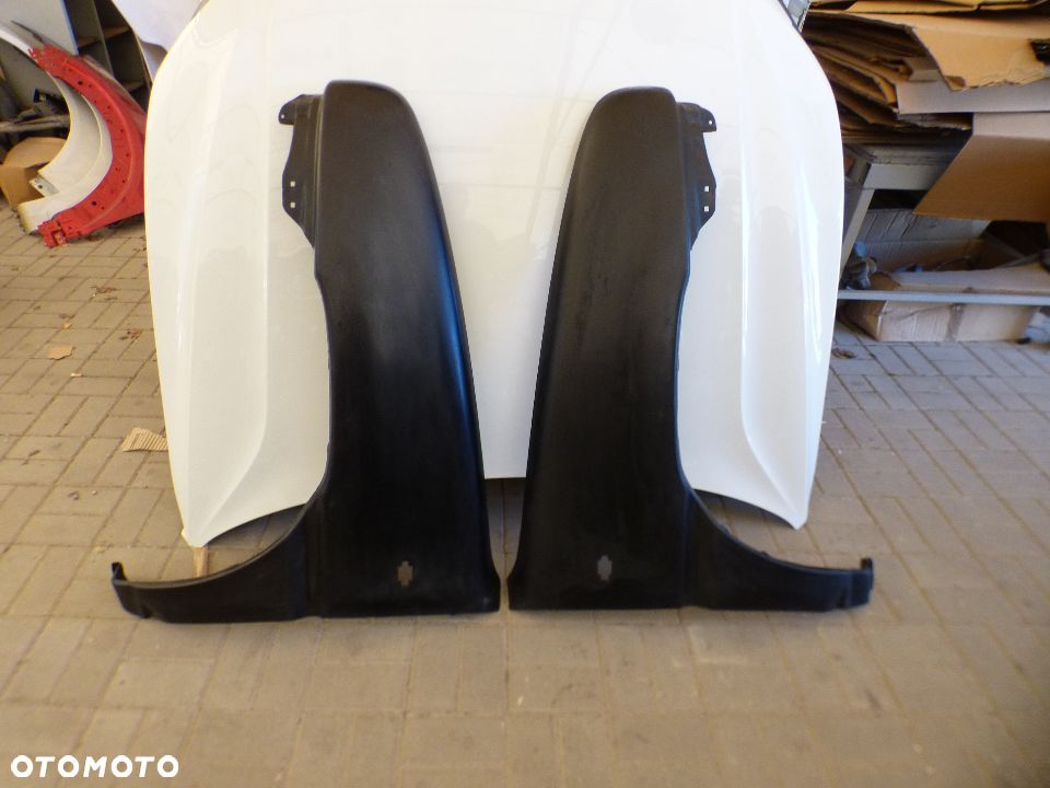 BŁOTNIK PRZÓD NISSAN TERRANO II (R20) 93-99 LEWY PRAWY - 1