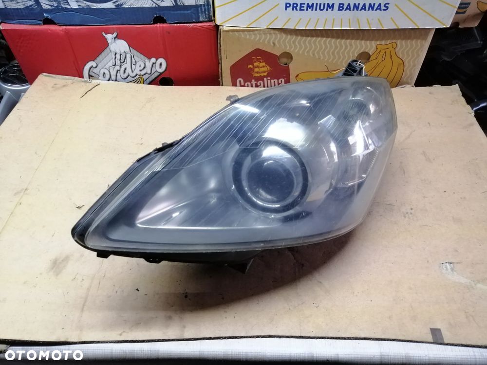 Opel Zafira B komplet lamp przednich Xenon 13252471RH 13252470LH EU - 2