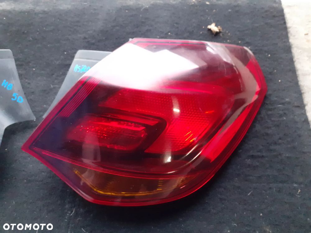 12146 Lampa lewy prawy tył Opel Astra J HB 5 drzwi - 2