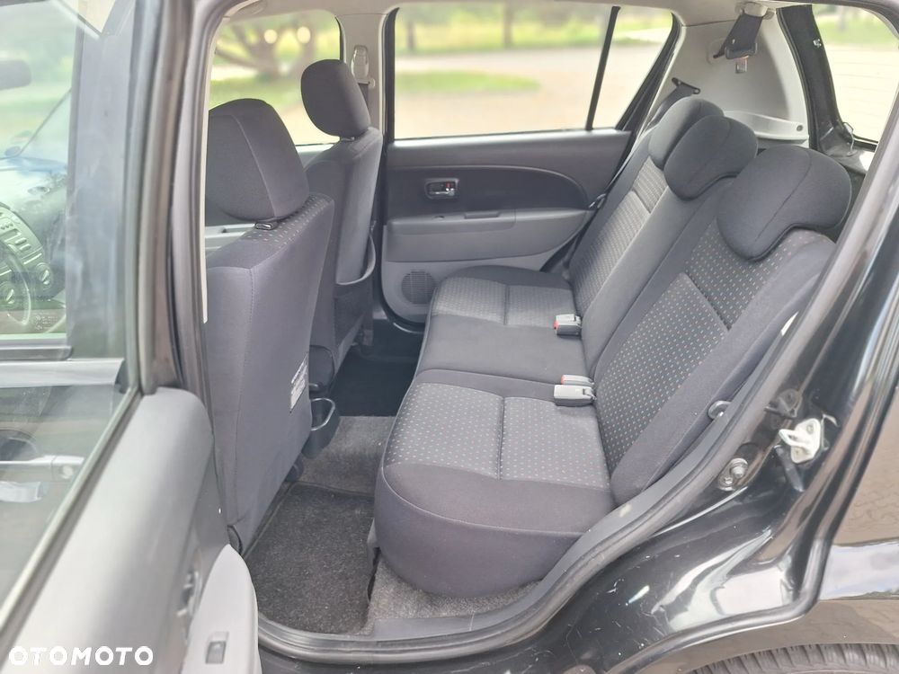 Daihatsu Sirion 1.3 - 13
