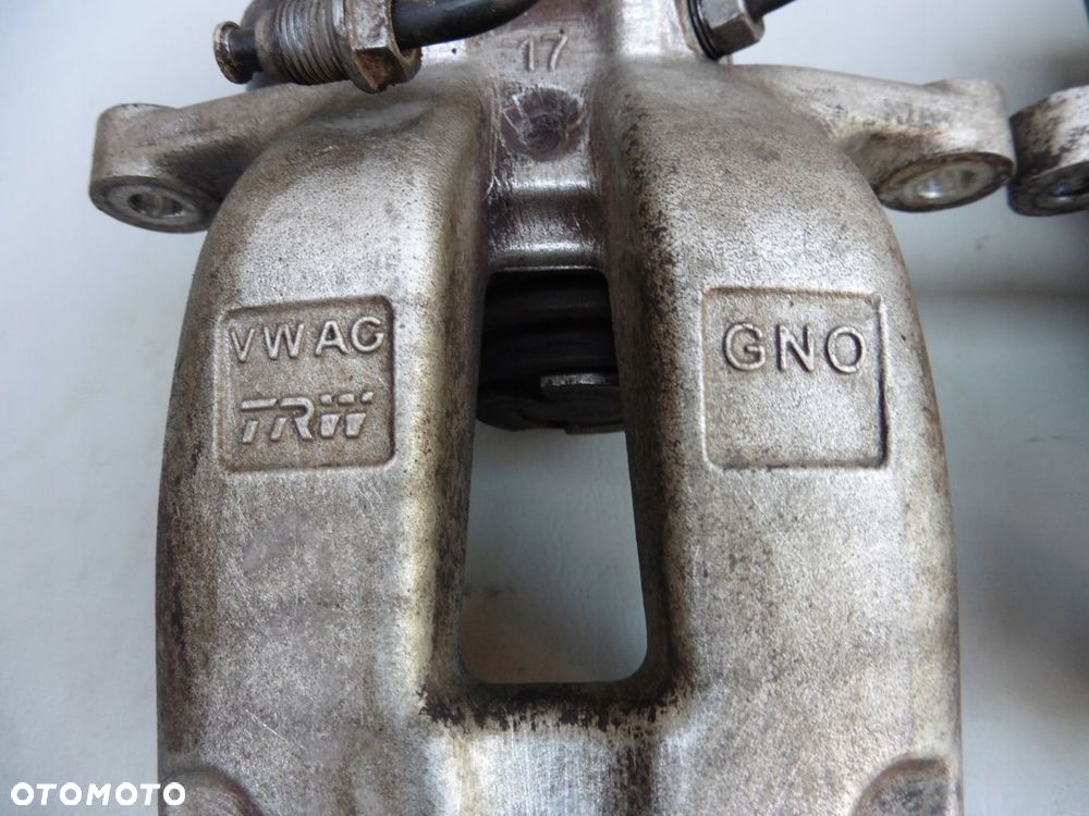 ZACISK HAMULCOWY PRAWY TYŁ VW PASSAT B6 B7 4X4 TRW - 4