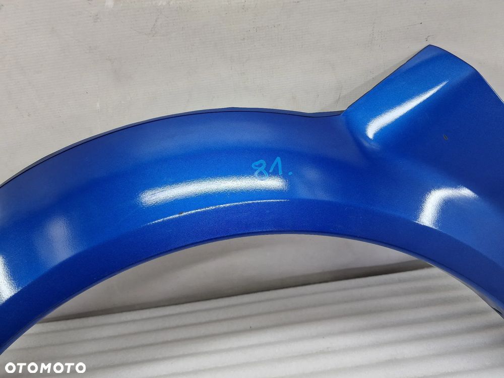 SUZUKI JIMNY 98-12 LEWA PRZEDNIA PRZÓD LISTWA / NAKŁADKA BŁOTNIKA , NR 77630-81A00 / 77630 E81A00-100 , NR AUKCJI NB81 - 5