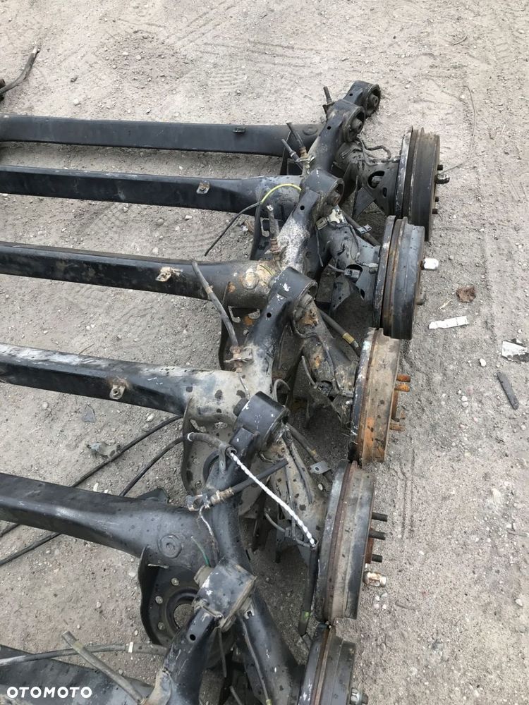 BELKA OŚ TYŁ TYLNA TOYOTA YARIS II BĘBNY W-WA - 3