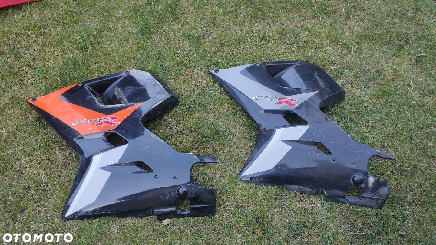 EU OSŁONA OWIEWKA BOK LEWA HYOSUNG GT 125 250R - 1