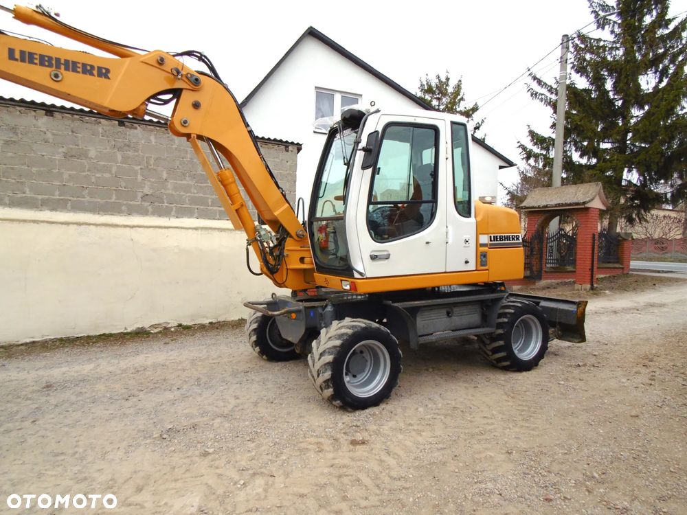 Liebherr 309 Litronic - 2