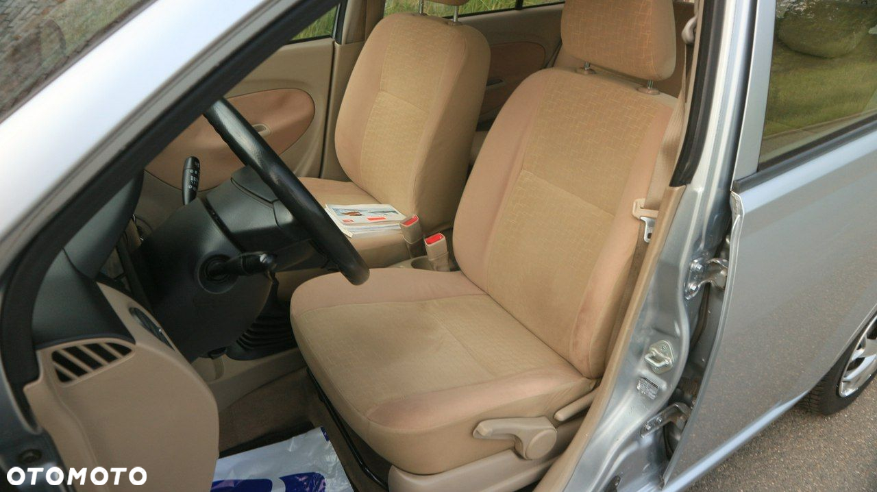 Daihatsu Cuore 1.0 Top - 26
