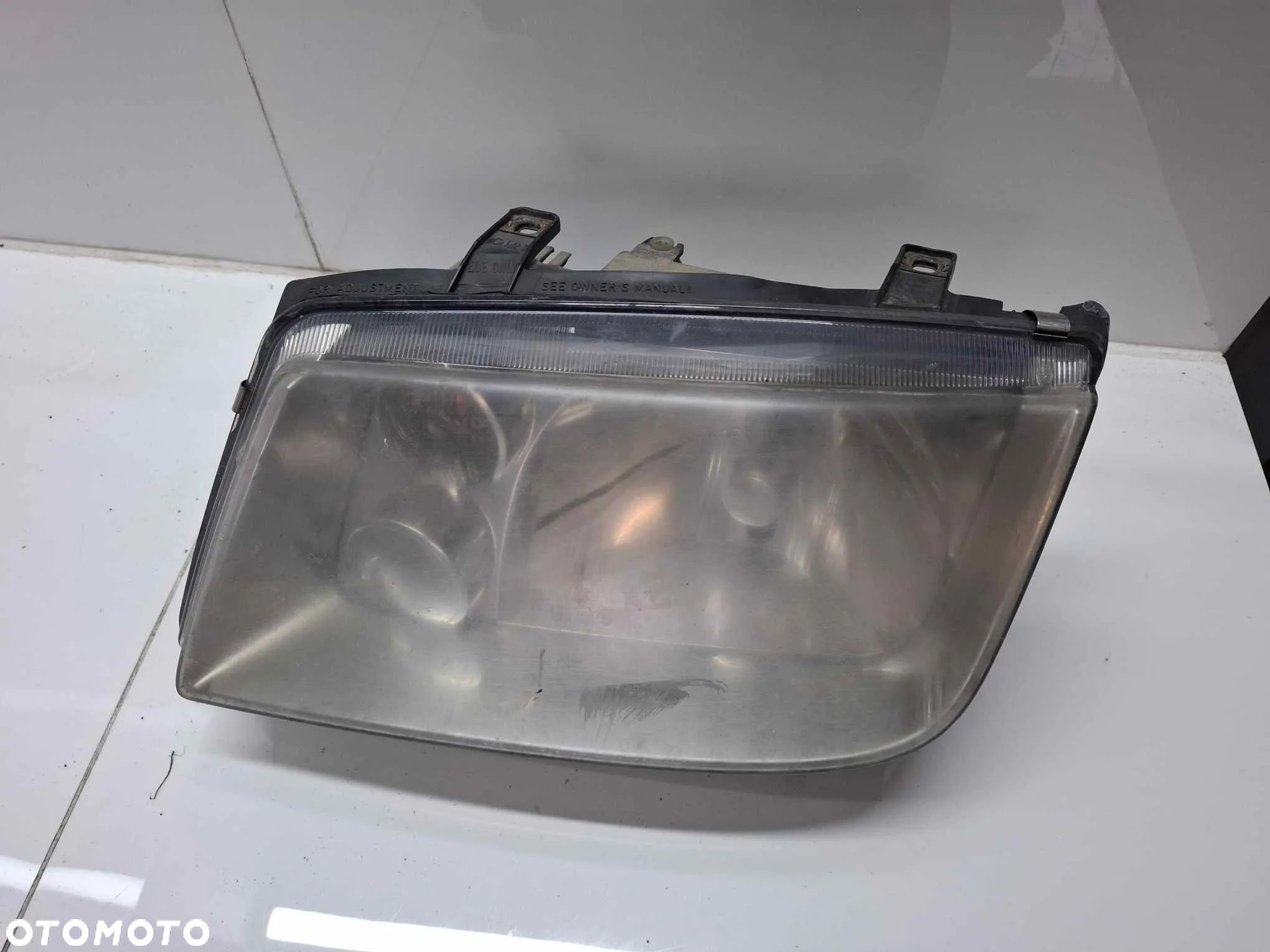 LAMPA LEWA PRZEDNIA PRZÓD VW BORA - 1