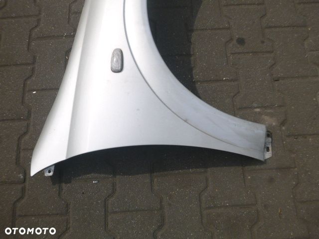 BŁOTNIK PRAWY PRZÓD PRAWY PRZEDNI OPEL ASTRA II G Z157 - 10