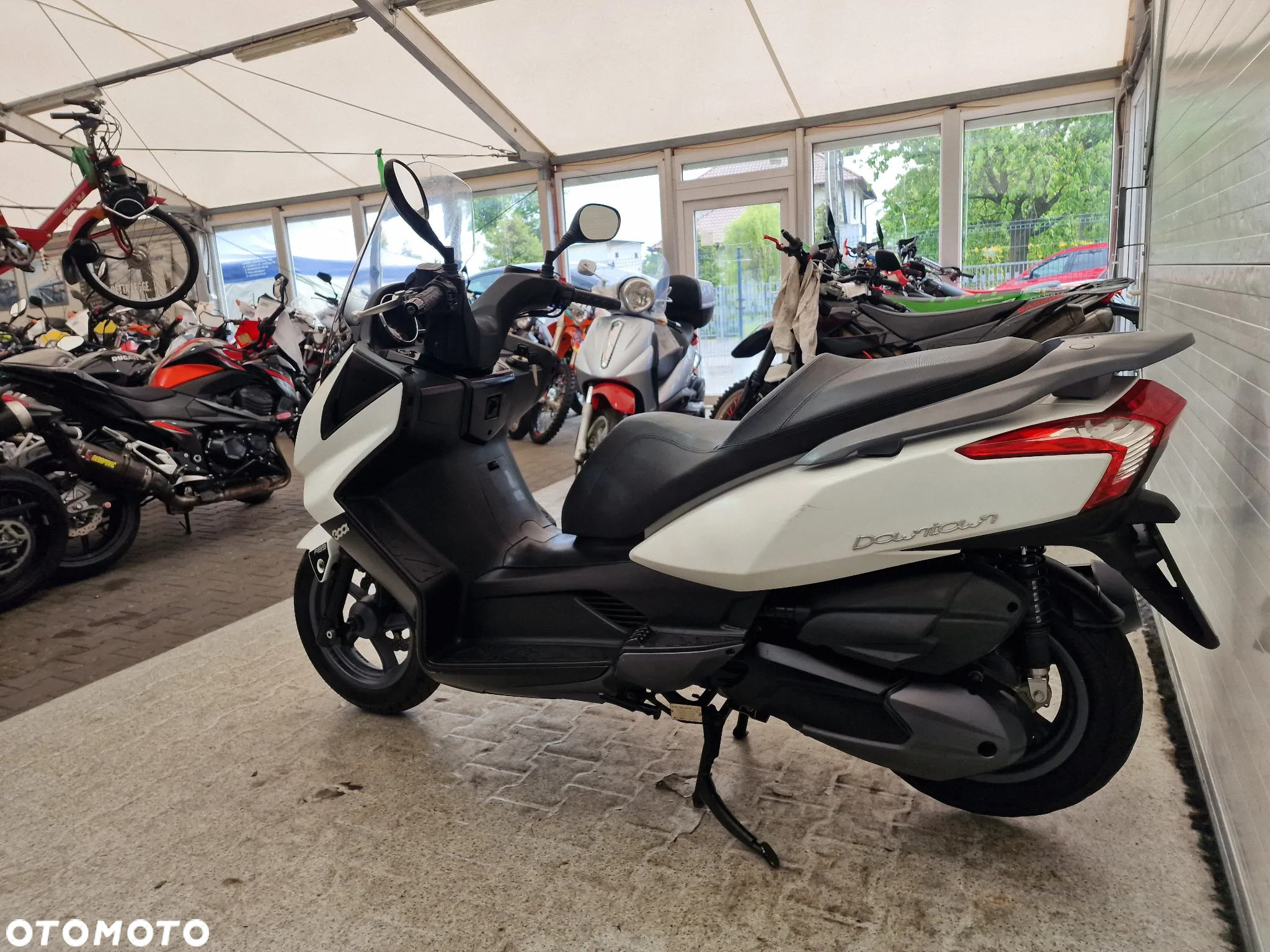 Kymco Xciting - 16