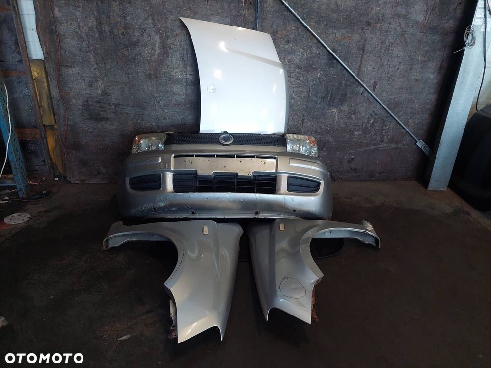 KOMPLETNY PRZÓD MASKA ZDERZAK BŁOTNIKI LAMPY PAS PRZEDNI FIAT PANDA II 647 - 1