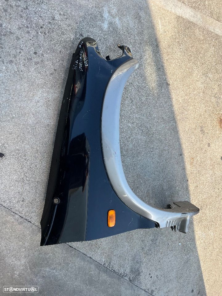 Guarda-lamas direito Kia sportage ano 2000 - 1