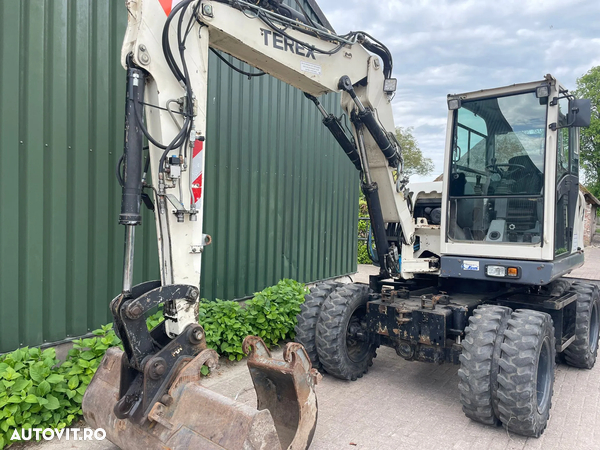 Terex TW70 excavator pe roti compact