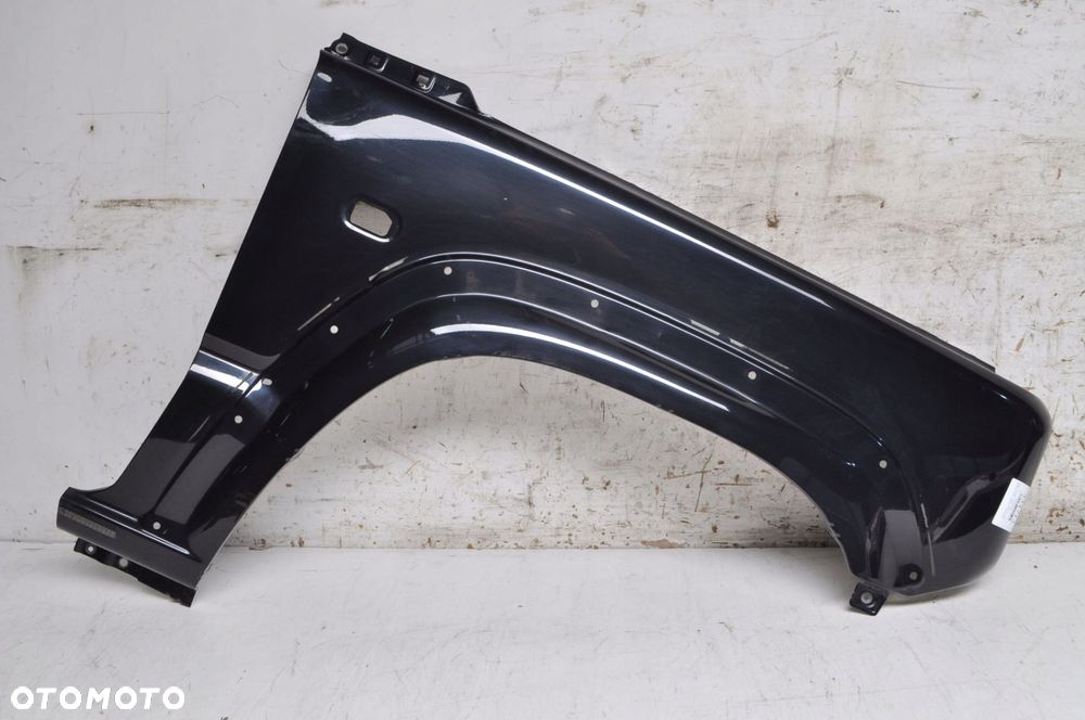 SUZUKI JIMNY IV BŁOTNIK PRAWY PRZÓD PRZEDNI - 1