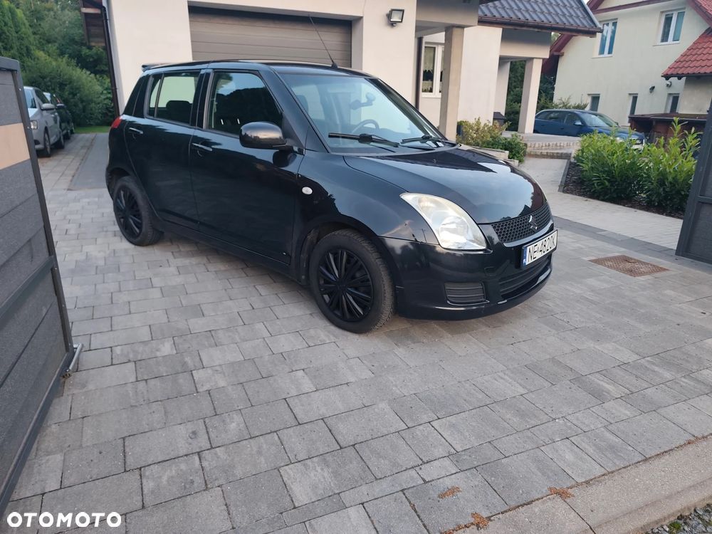 Suzuki Swift 1.3 Club - 10