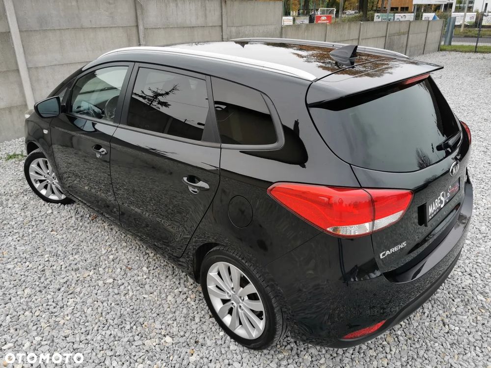 Kia Carens - 31