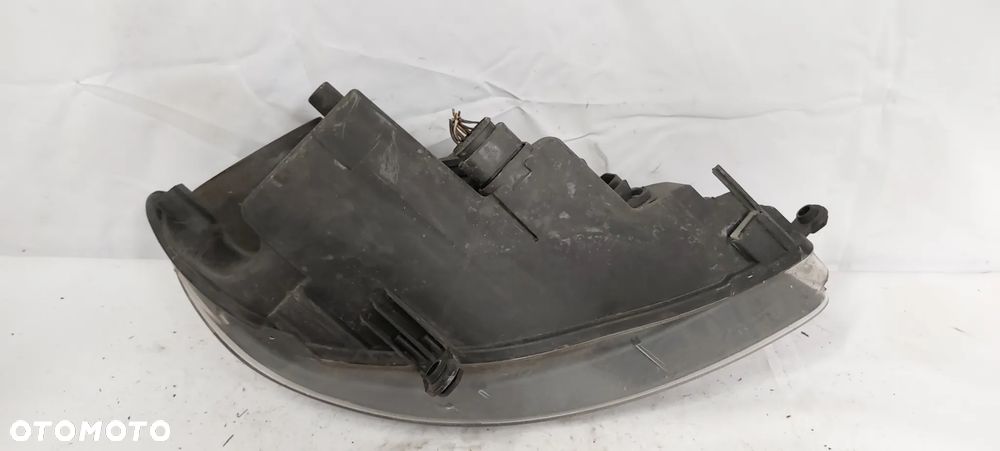 .  LAMPA PRZOD PRZEDNIA LEWA VOLKSWAGEN GOLF 5 PLUS - 4