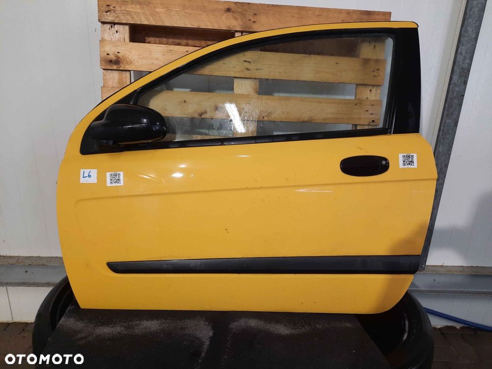 $ DRZWI LEWY PRZÓD KOMPLETNE CHEVROLET AVEO ŻÓŁTY - 1