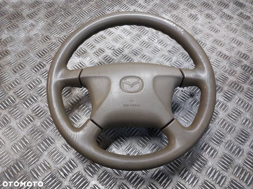 KIEROWNICA + PODUSZKA MAZDA 323 PROTEGE BJ BJ0E57K00 - 1