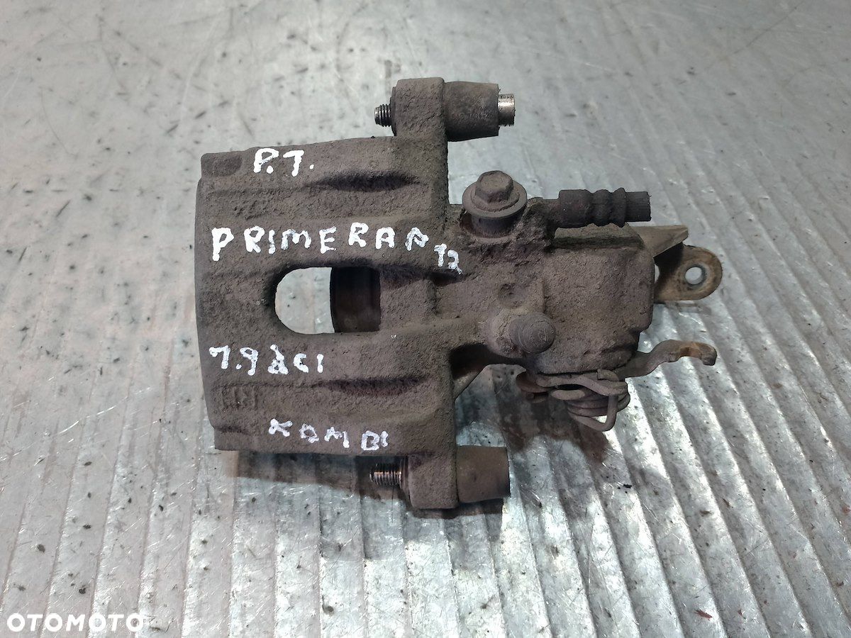 ZACISK HAMULCOWY PRAWY TYŁ NISSAN PRIMERA P12 1.9 - 1