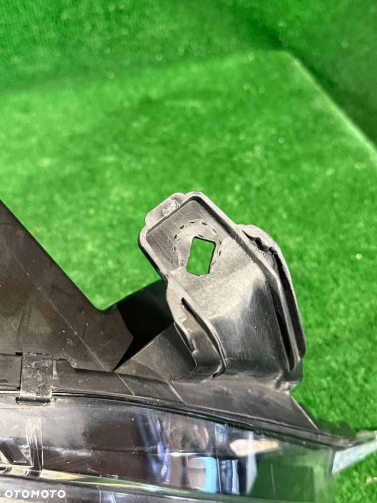 REFLEKTOR PRAWY OPEL ASTRA J GTC XENON NR:667 - 5