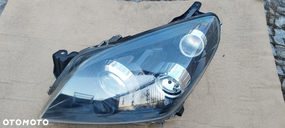 Lampa Przednia Prawa Opel Astra III 2003-2012 Bi xenon Skrętny Oryginał 1216665 1216569 93178647 - 1