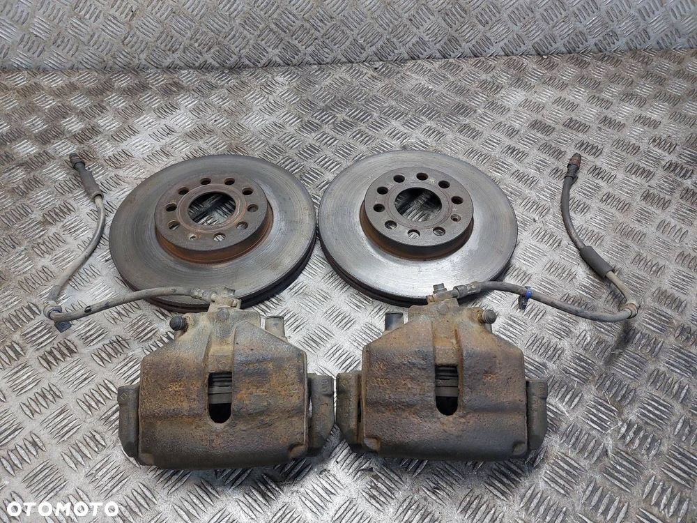 TARCZE HAMULCOWE PRZÓD + KLOCKI + ZACISKI SEAT LEON II 2.0 TDI - 1