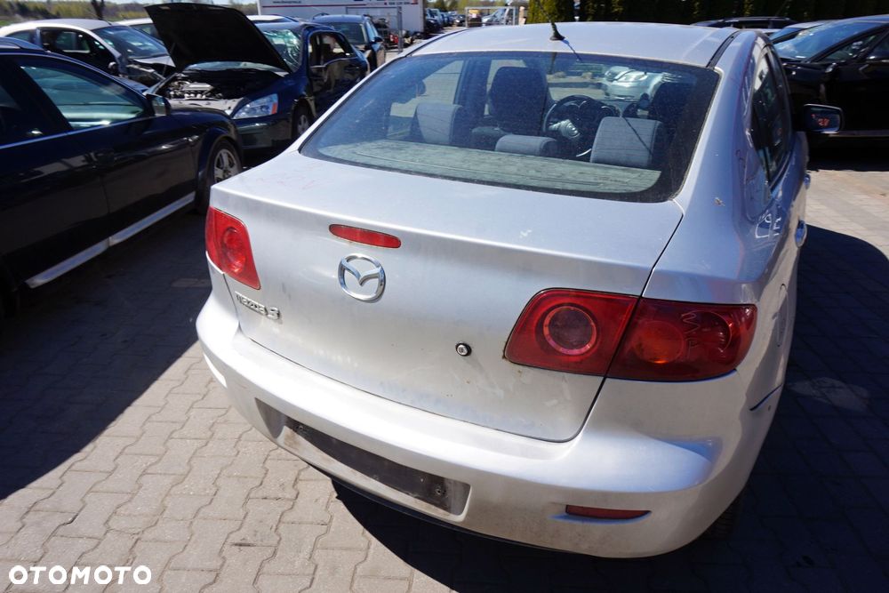 KLAPA BAGAŻNIKA TYLNA 3 I BK SEDAN 22V  SREBRNY MAZDA 2003-2006 - 2