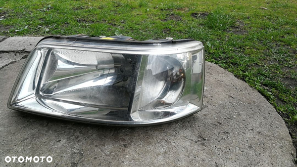 Lampa lewa przód EU Volkswagen T5 Transporter 03-