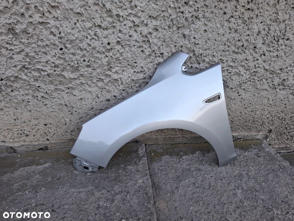 BŁOTNIK PRZEDNI LEWY OPEL ASTRA J IV Z176 - 1