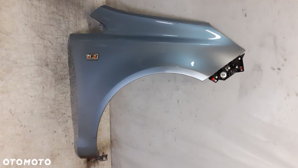 *OPEL CORSA D BŁOTNIK PRZÓD PRZEDNI PRAWY Z163 - 1