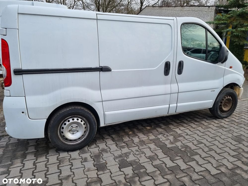 LISTWA KAROSERII ZDERZAK LEWA PRAWA BIAŁY TRAFIC VIVARO 01-14r. - 2