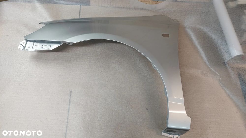 TOYOTA COROLLA E12 02-07 BŁOTNIK LEWY LUB PRAWY SEDAN KOMBI 1C0 CYNK. - 1