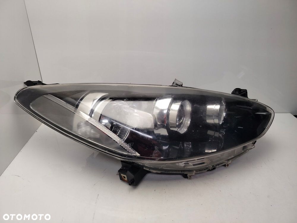 mazda 2 de 2011r reflektor lampa prawy przód prawa przednia soczewka - 3