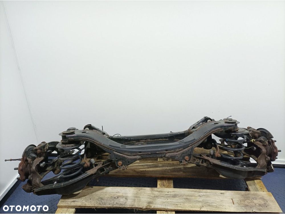 TOYOTA AURIS II LIFT KOMBI BELKA WÓZEK ZAWIESZENIA TYŁ - 1