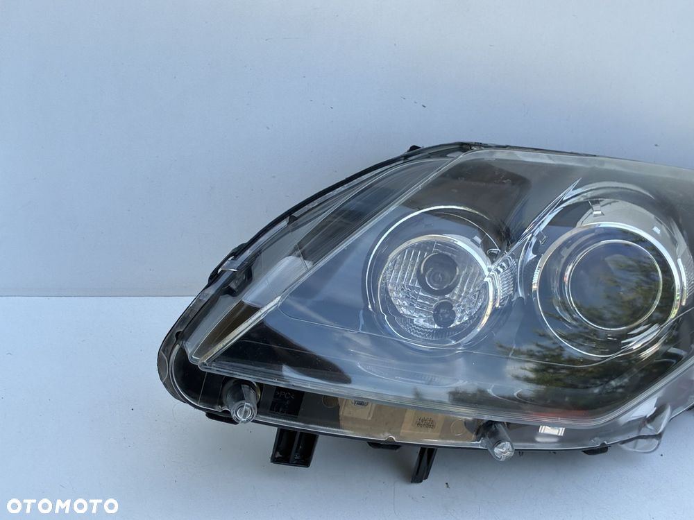 RENAULT LAGUNA III 07-15 LAMPA PRZÓD PRZEDNIA LEWA  EU 26060076R  89902288 - 4